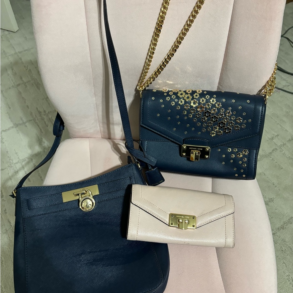 Michael Kors two navy purses and one pink wallet